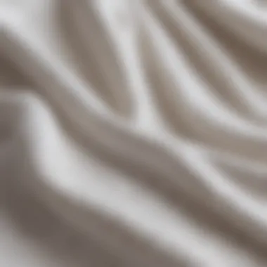 Close-up of fabric texture of a short white dress